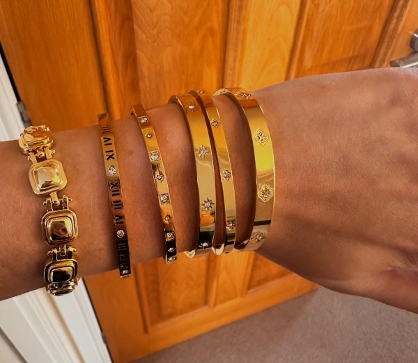 gold bangles on model